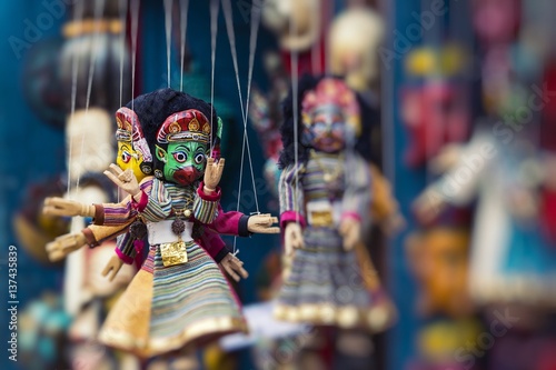 Masks, dolls and souvenirs in street shop at Durbar Square in Kathmandu, Nepal.