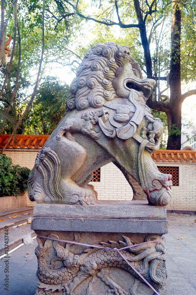 Stone lions at the gate, is one of the traditional Chinese folk. In Shenzhen, china. Stone lions at the gate, is one of the traditional Chinese folk. In Shenzhen, china.