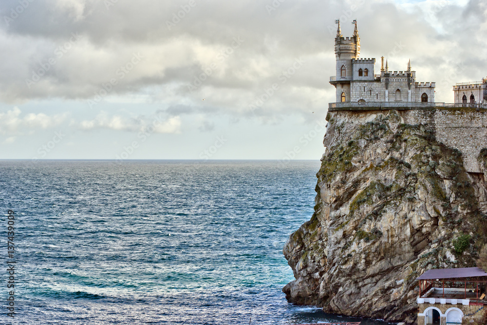 This is view of the castle Lastochkino gnezdo, the rock and Black sea. Gaspra, Crimea