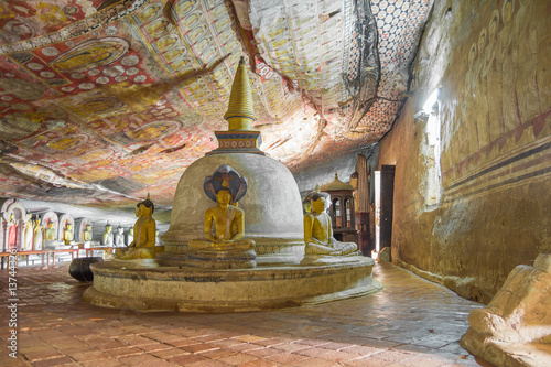 dambulla cave with buddha statues on sri lanka