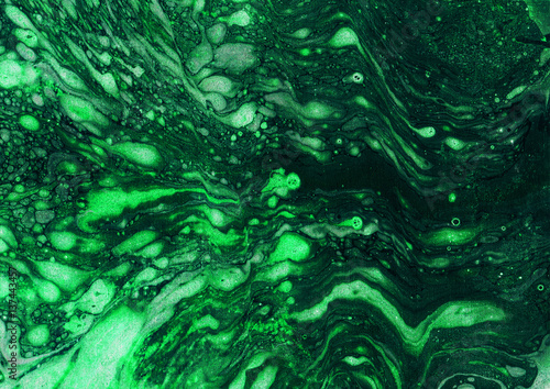 Abstract hand-made texture. Marbling green background for design
