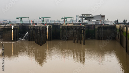 Cardiff Bay barrage including control building. Seaward side of barage between Queen Alexandra Dock and Penarth Head in Cardiff, Wales, UK photo