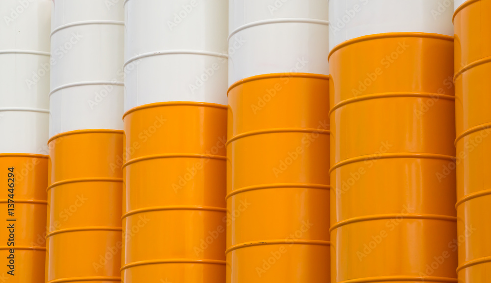 close up yellow steel silos background and texture, metal silos for concrete mix process plant. close up yellow steel silos background and texture, metal silos for concrete mix process plant.