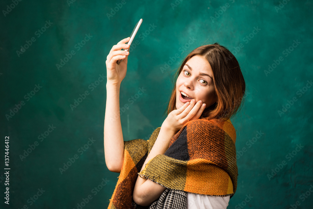 Happy surprised woman doing selfie with cell phone Happy surprised woman doing selfie with cell phone
