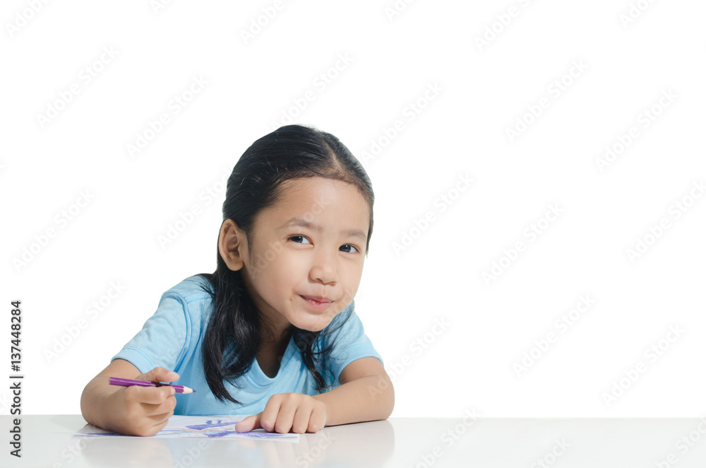 Portrait of smile Asian little girl drawing with pencil isolated on white background with clipping path Portrait of smile Asian little girl drawing with pencil isolated on white background with clipping path