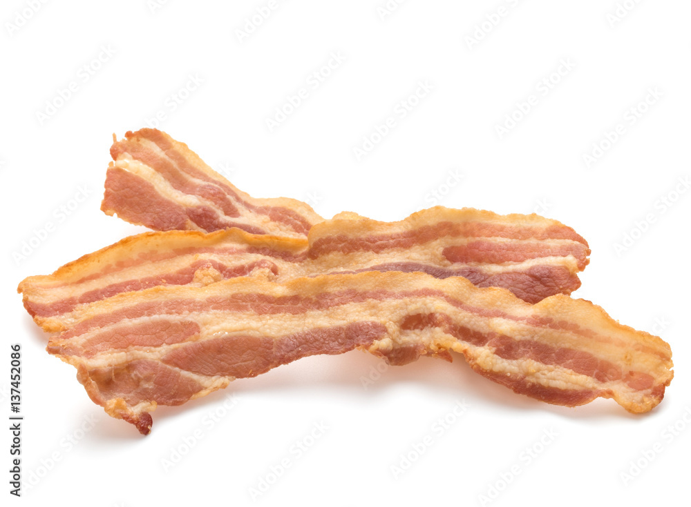 cooked crispy slices of bacon isolated on white background cooked crispy slices of bacon isolated on white background