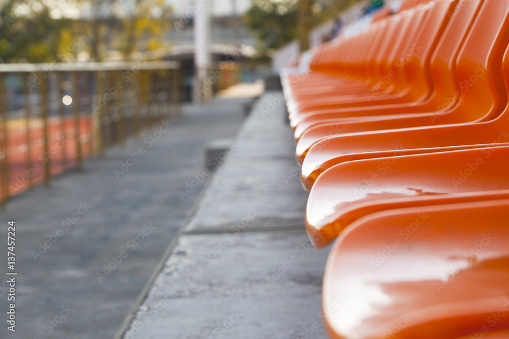 Fototapeta premium Empty plastic seats at stadium