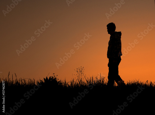 Silhouette off a man walking