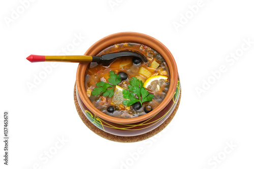 Meat solyanka- traditional Russian soup.