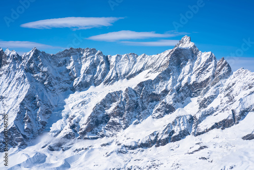 View of Italian Alps from Plateau Rosa in the winter in the Aosta Valley region of northwest Italy.
