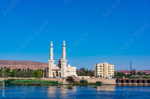 The El-Tabia Mosque in Aswan, Egypt. Egyptian Mosque Minarets. Aswan Mosque along the Nile River with two minarets.