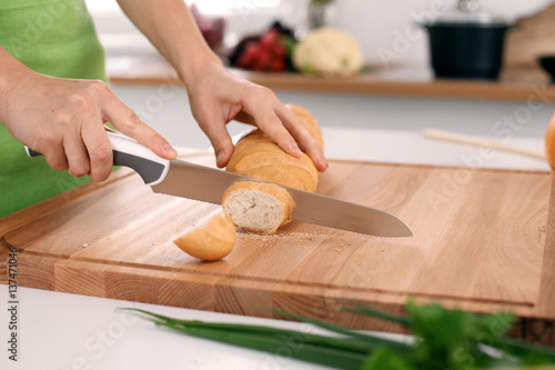 Bilde på lerret Close up of  woman's hands cooking in the kitchen