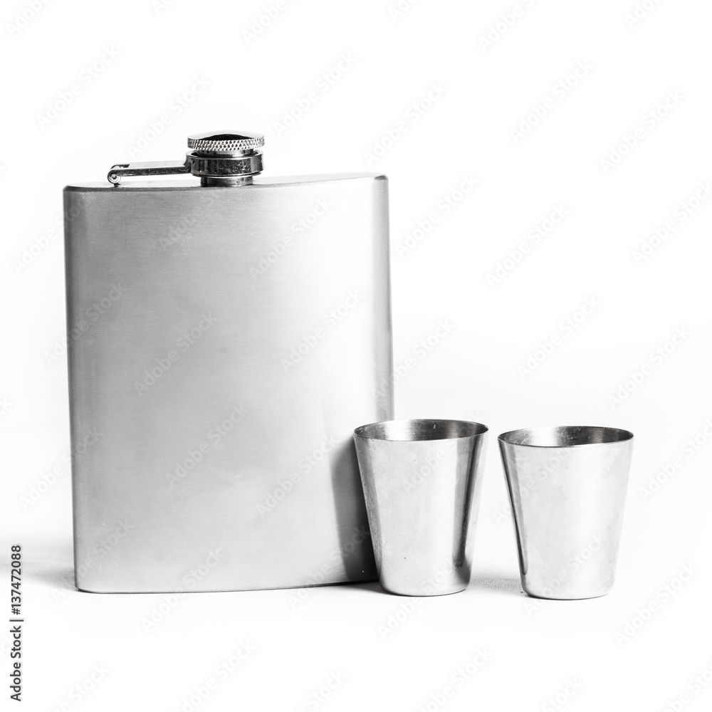 Hip flask and cups isolated on white Hip flask and cups isolated on white
