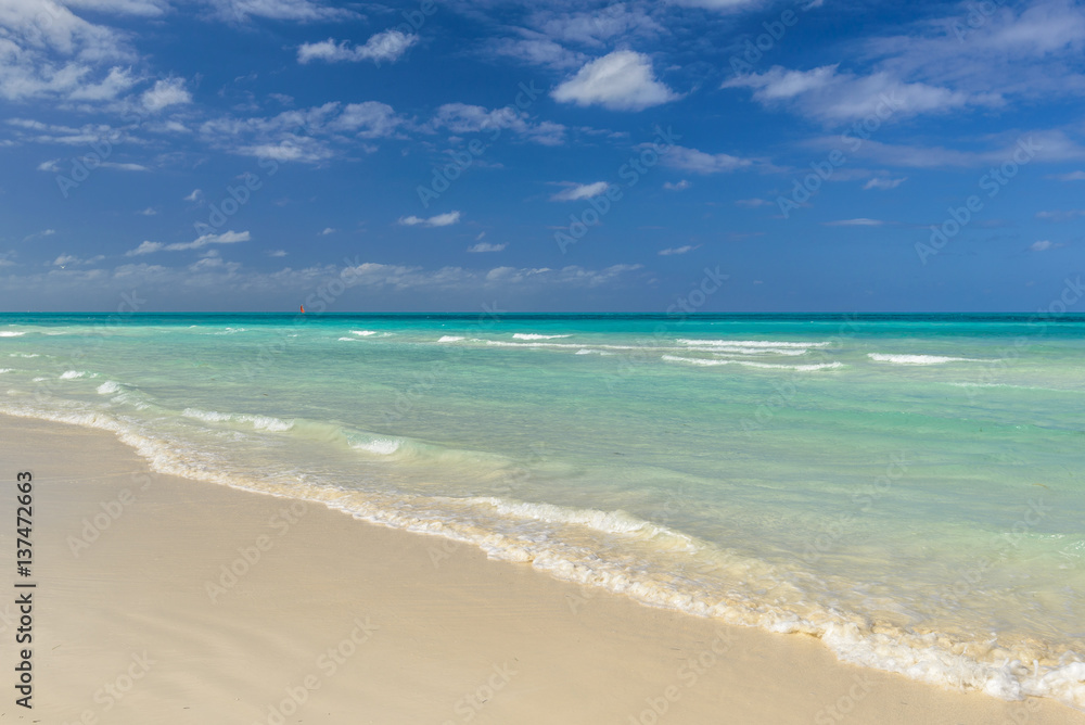 Cuba. Exotic beach nature and clouds on horizon. Summer beach paradise.