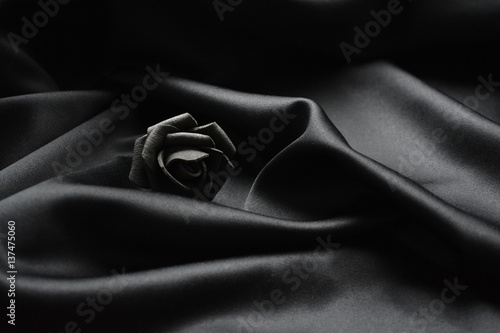 black rose on black fabric