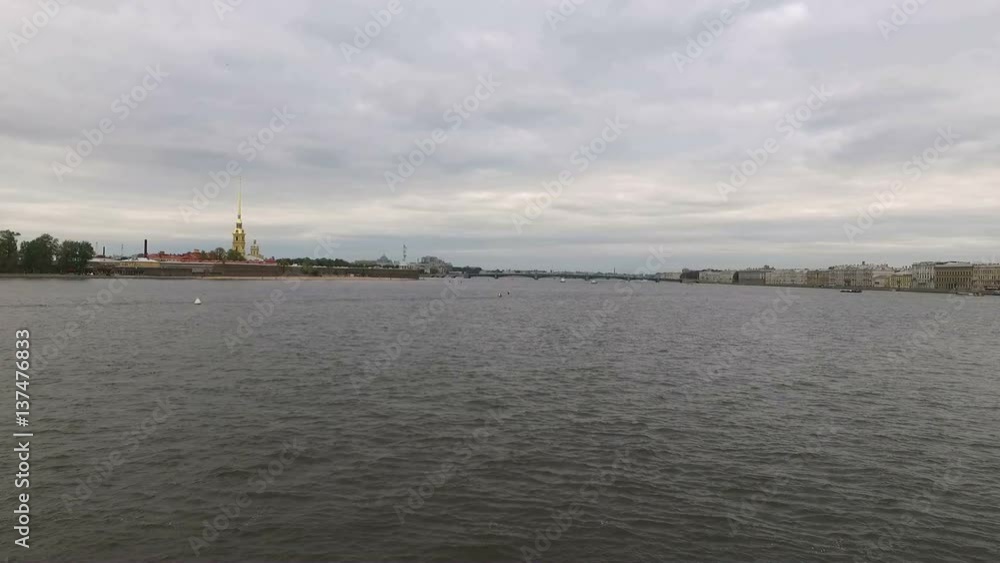 Wedding couple looking at Petr and Paul fortress Saint-Petersburg shot Wedding couple looking at Petr and Paul fortress Saint-Petersburg shot