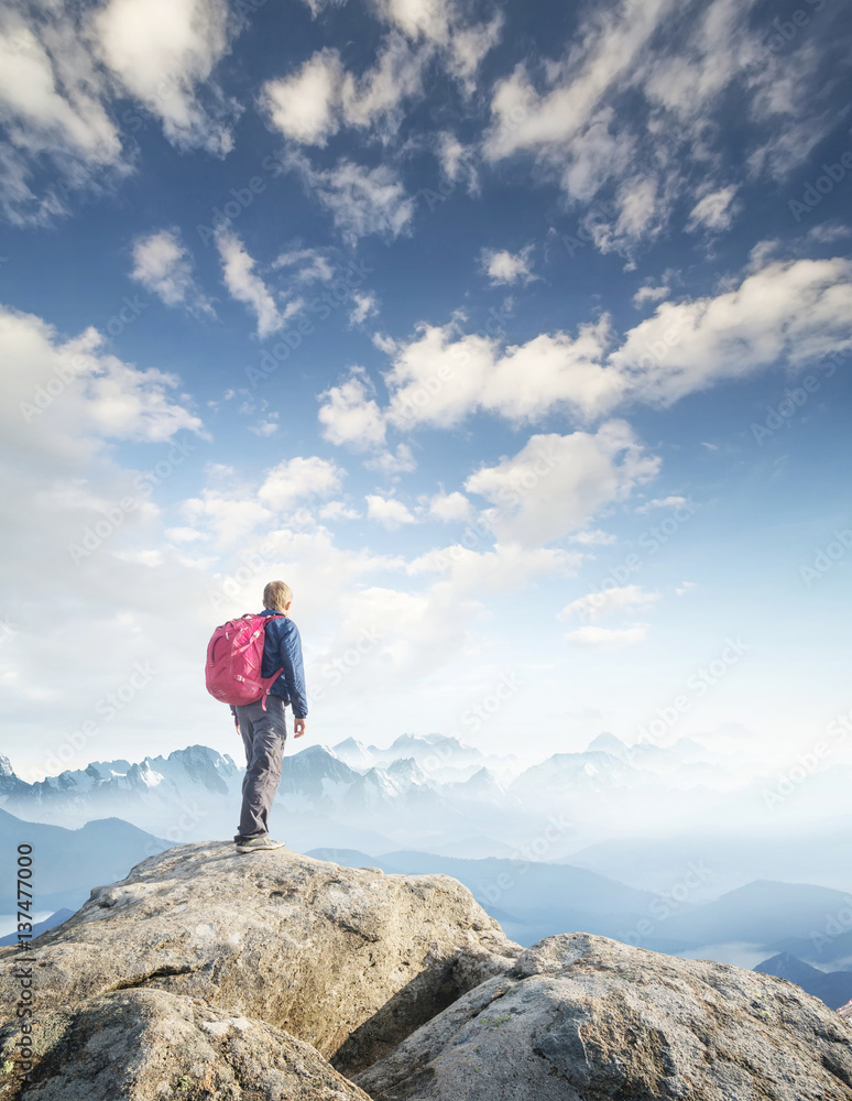 Tourist on mountain peak. Sport and active life concept.. Tourist on mountain peak. Sport and active life concept..