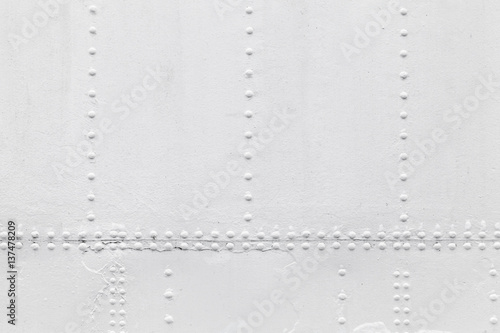 Cuadro en lienzo Old ship hull fragment, white metal wall