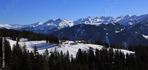 Braunwald ski area and snow covered mountains