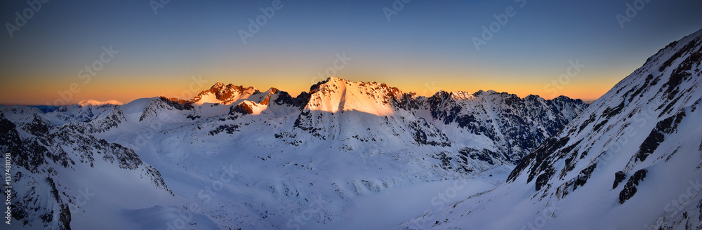 Fototapeta premium Panoramic view of Kozi Wierch at sunrise. Tatra mountain National Park