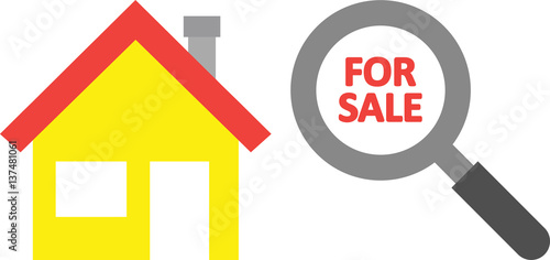 House with for sale inside magnifying glass