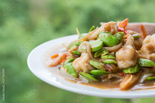 Fried shrimp with Sataw and Shrimp Paste on white dish