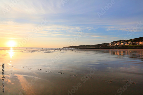 Naklejka sunset over woolacombe beach in devon