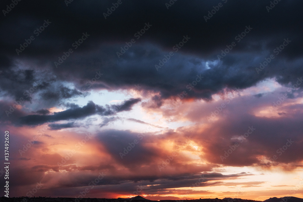 colorful sky with sun background in mountains. sunset, sunrise.
