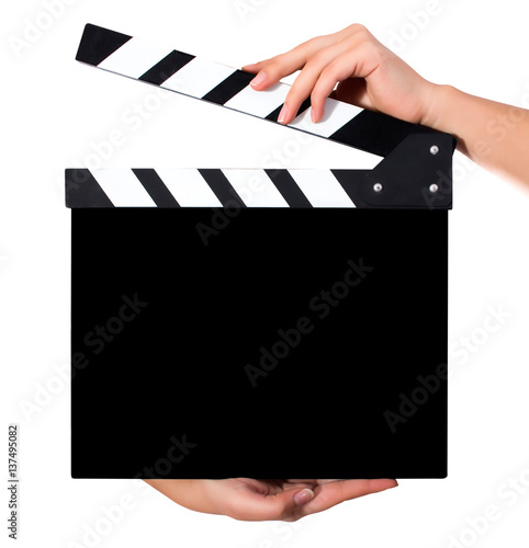 Hands holding a clapper board