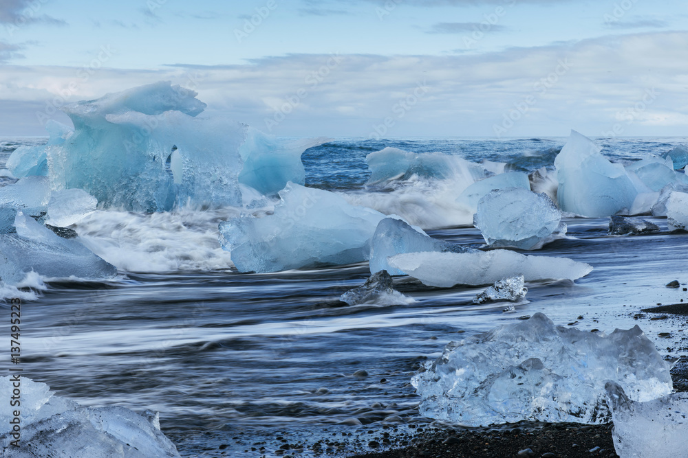 Glacier on black volcanic beach Iceland Glacier on black volcanic beach Iceland