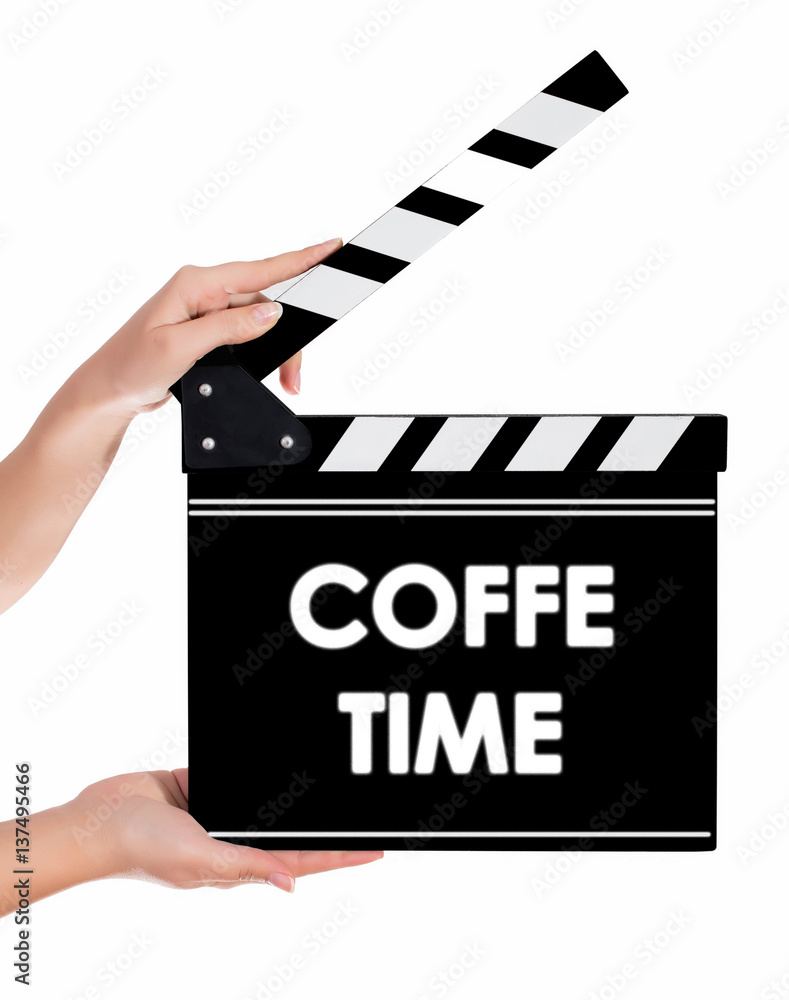 Hands holding a clapper board with COFFE TIME text