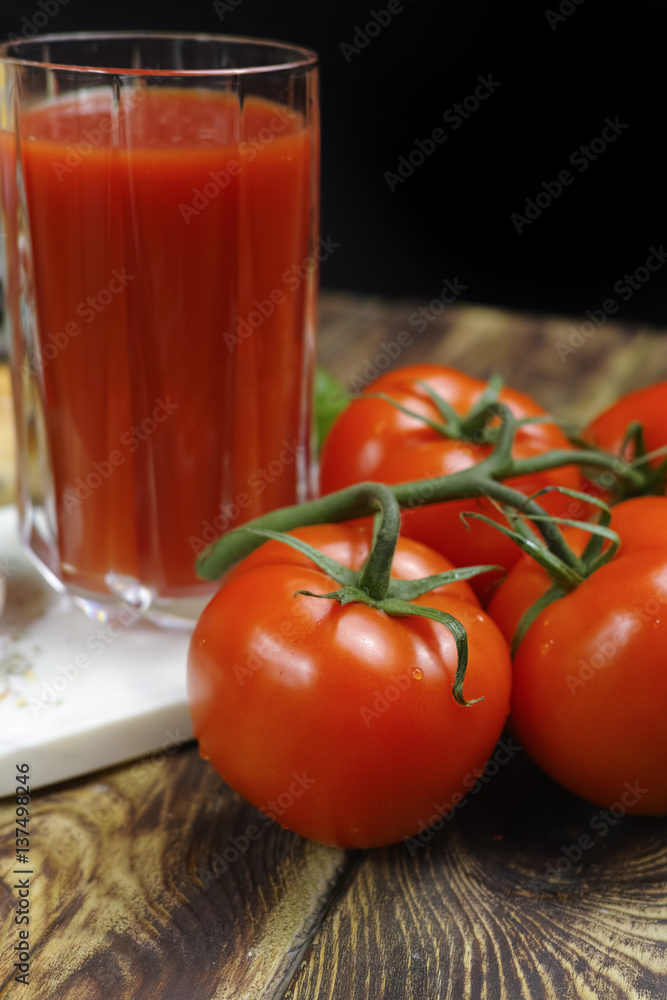 Raw Organic red Tomato Juice with salt, basil and bread Raw Organic red Tomato Juice with salt, basil and bread