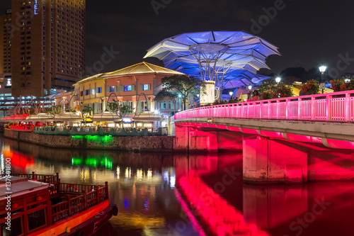 Singapore - December 3, 2016 : Clarke Quay is a historical riverside quay. Now, famous for dinner and night entertainment. photo