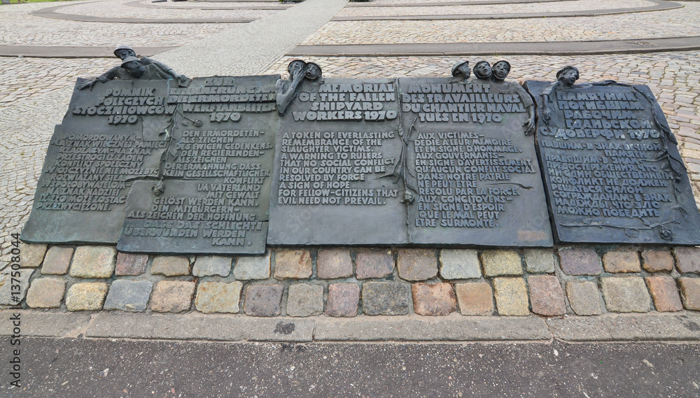 Gdansk-Poland June-2016. Memorial of the fallen Shipyards workers in 1970 in four different languages. - obrazy, fototapety, plakaty 
