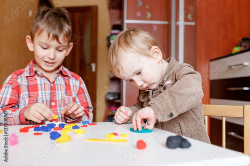 children playing with color play dough
