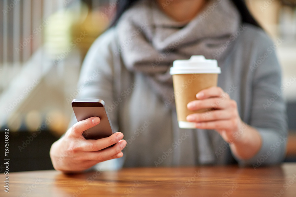 close up of woman with smartphone and coffee close up of woman with smartphone and coffee