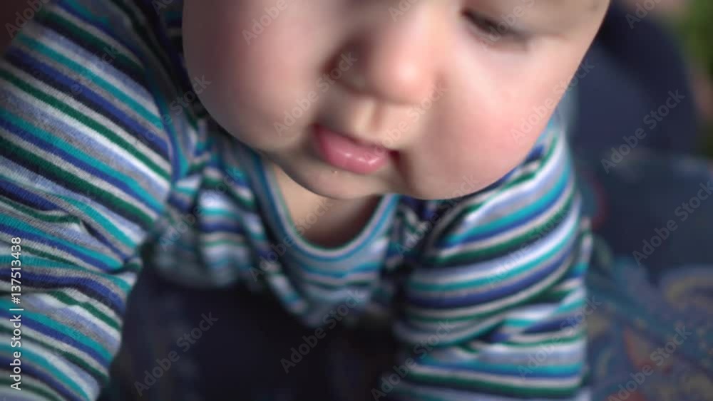 Close up portrait: baby moves and focus changes Close up portrait: baby moves and focus changes