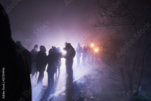 people standing and watching fireworks, silvester, dark, silhouette