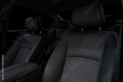 Leather car seats background. Interior detail. © alexdemeshko