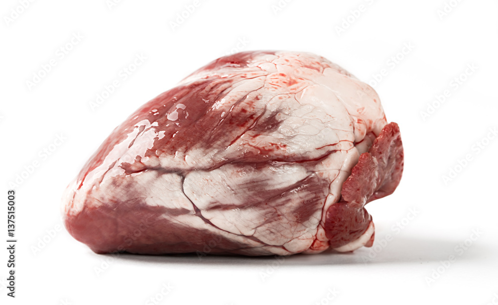 Raw sheep heart isolated on a white background