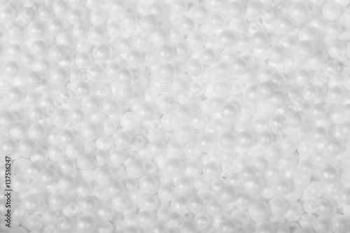 White styrofoam balls background. Close shot. photo