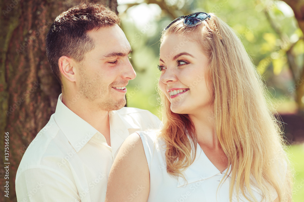 Happy couple having romantic date in park Happy couple having romantic date in park