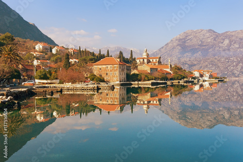 View of Bay of Kotor near Prcanj town on a sunny winter day. Montenegro