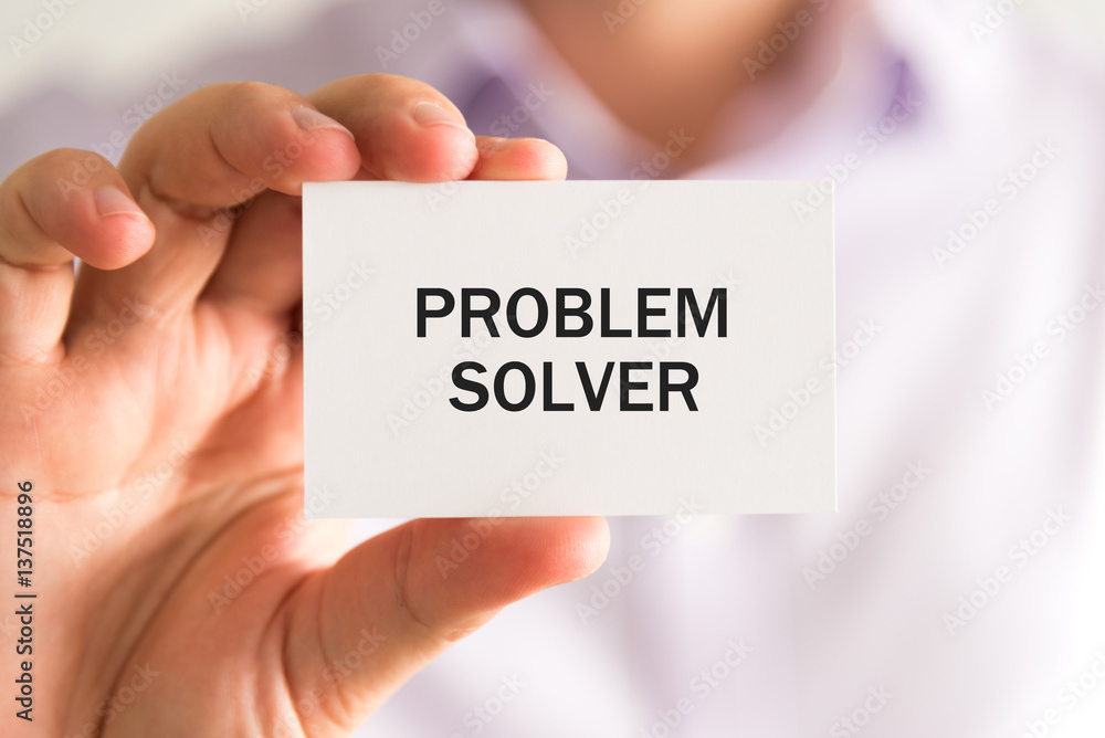 Businessman holding a card, text PROBLEM SOLVER