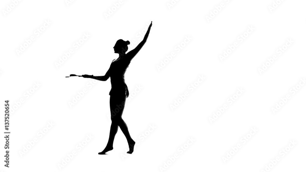 Gymnast mace toss up and juggling it. White background. Silhouette. Slow motion Gymnast mace toss up and juggling it. White background. Silhouette. Slow motion