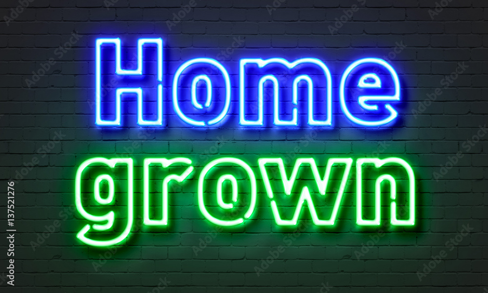 Home grown neon sign on brick wall background. Home grown neon sign on brick wall background.