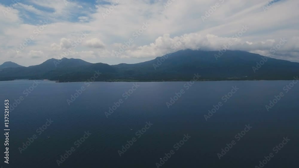 Aerial view coastline on tropical island with sea, trees and palms. Aerial footage.Aerial video from flying drone of amazingly beautiful landscape of nature with mountains,hills, rain forest. Seascape Aerial view coastline on tropical island with sea, trees and palms. Aerial footage.Aerial video from flying drone of amazingly beautiful landscape of nature with mountains,hills, rain forest. Seascape