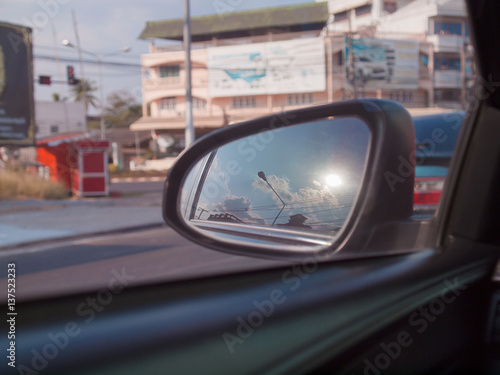Traveling, rear view mirror road view