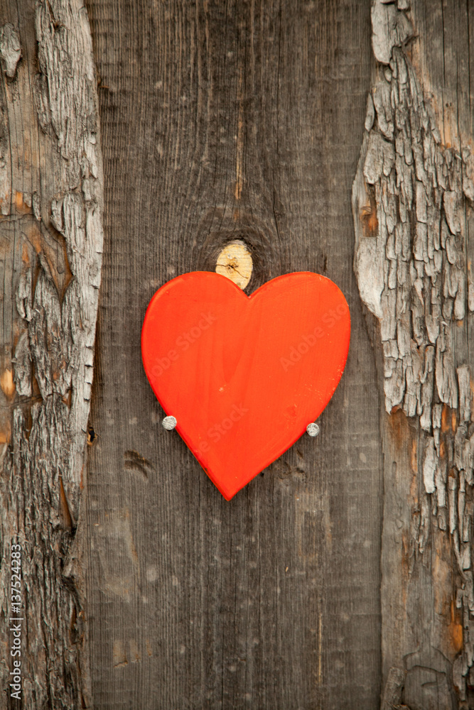 Red heart on a rustic wooden background. St. Valentine's Day Red heart on a rustic wooden background. St. Valentine's Day