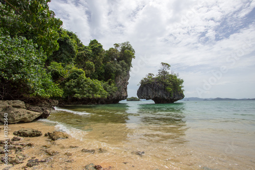 Limestone cliffs,white sand and pretty clear water at Hong Islands,Krabi Province,Southern Thailand © mickey_41